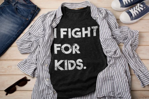Picture of I Fight For Kids t-shirt with a cool outfit.